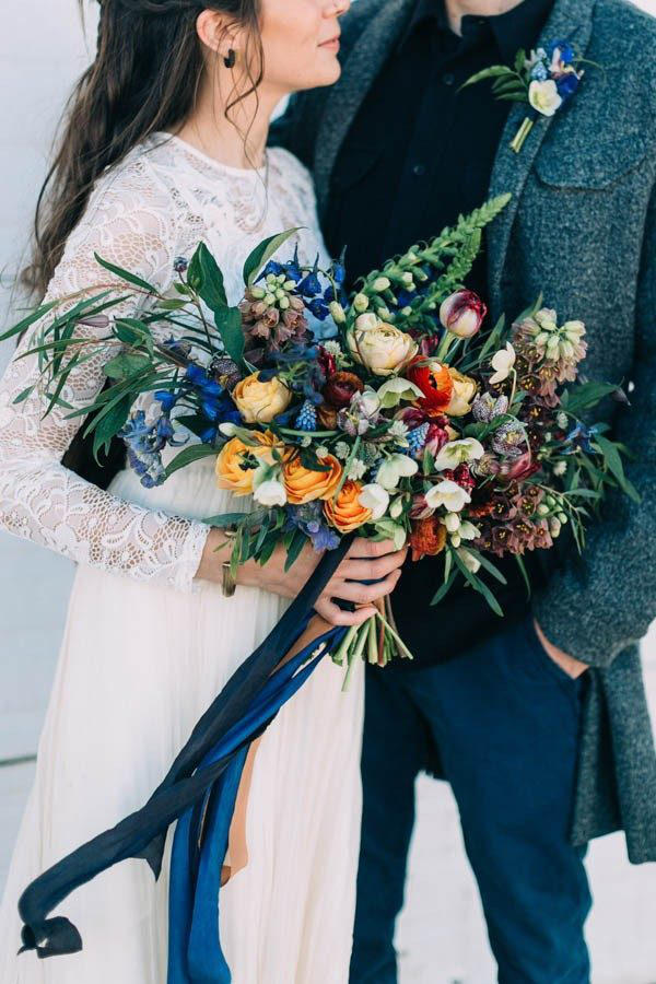 Rustic wedding bouquet with blue accents