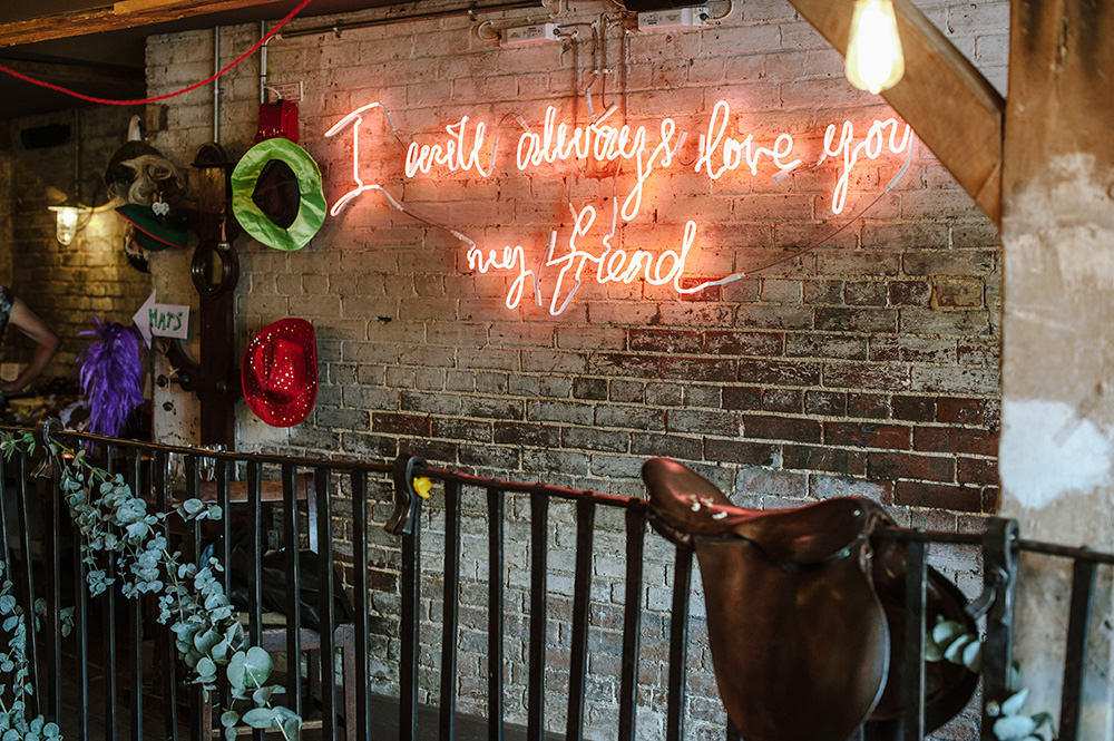 Warehouse wedding neon lighting