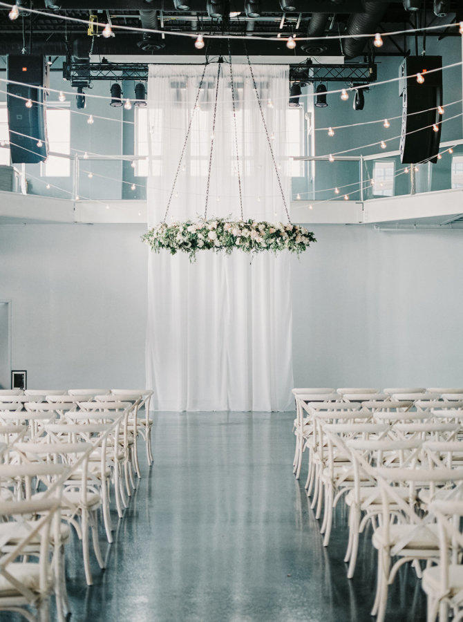 floral chandelier wedding ceremony backdrop