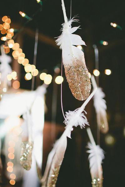 gold dipped feathers for warehouse wedding