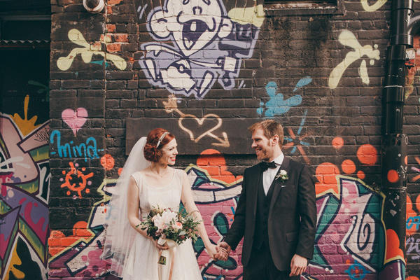 classic urban wedding with graffiti