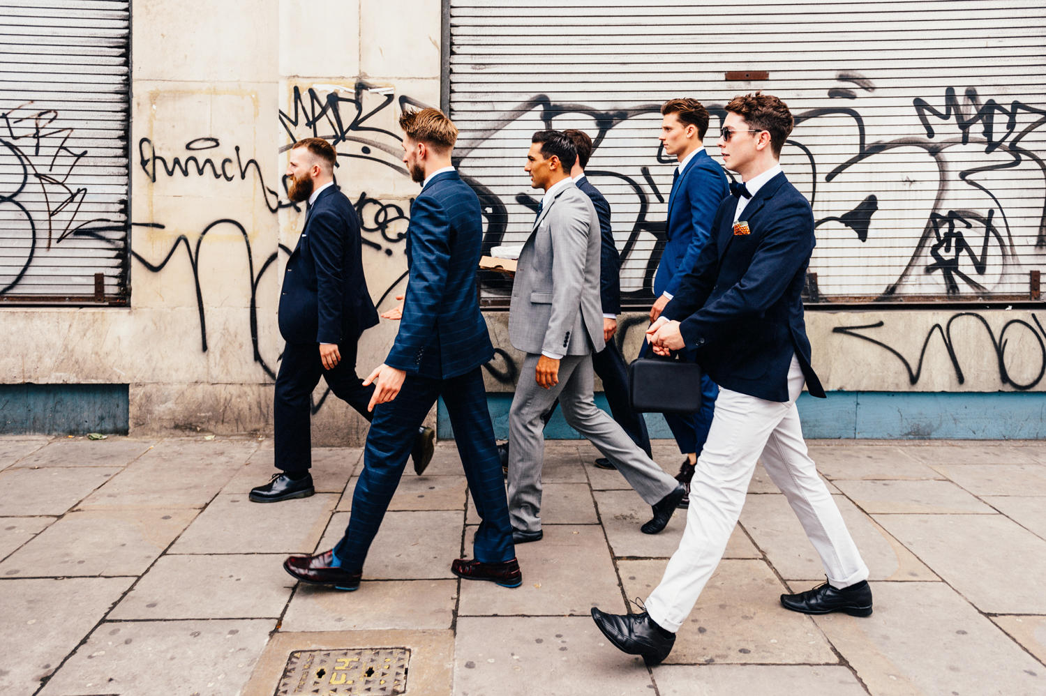 grooms men co-ordinated in blue