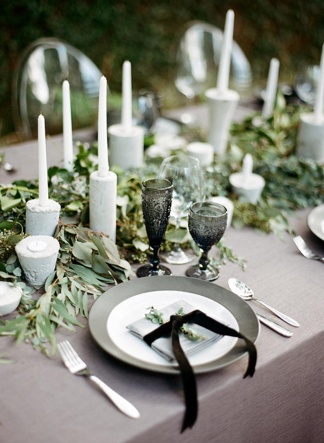 monochrome wedding table styling with greenery