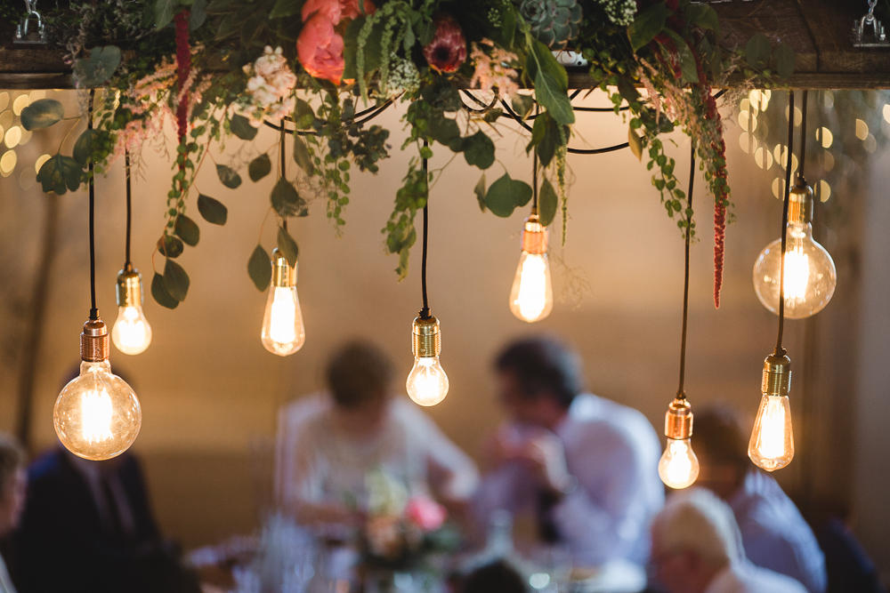 Autumn wedding Edison light bulb installation