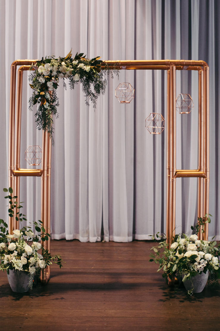 winter wedding industrial copper arch