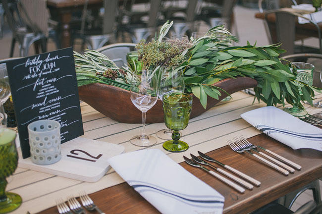 industrial wedding with greenery table styling