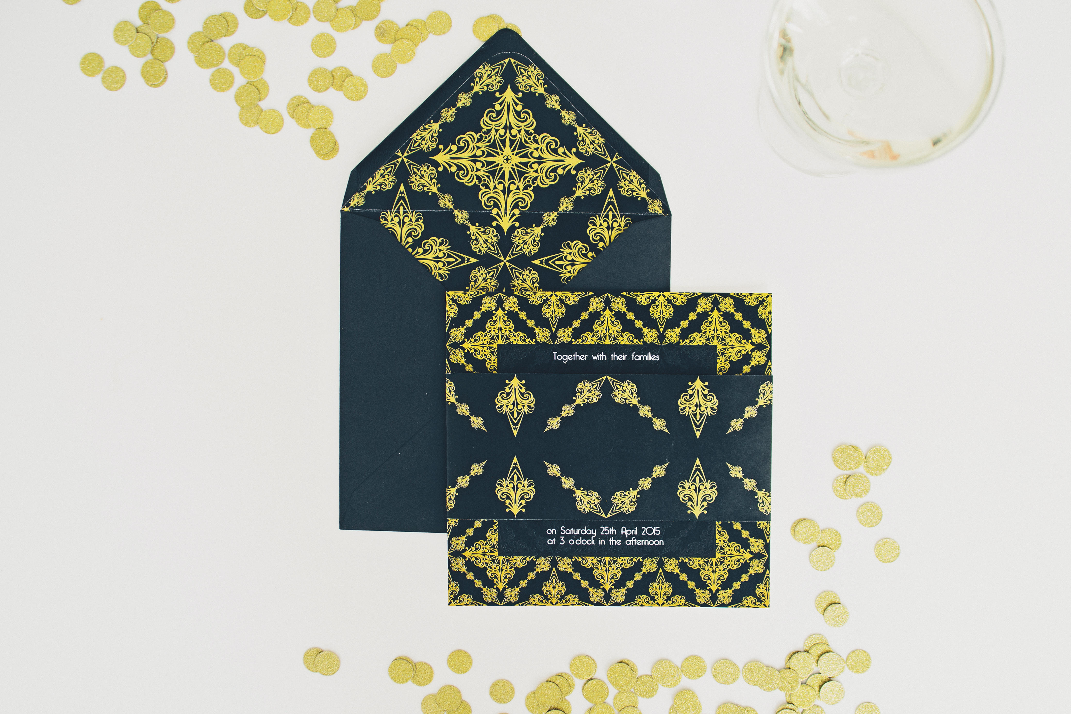 black and gold wedding stationery