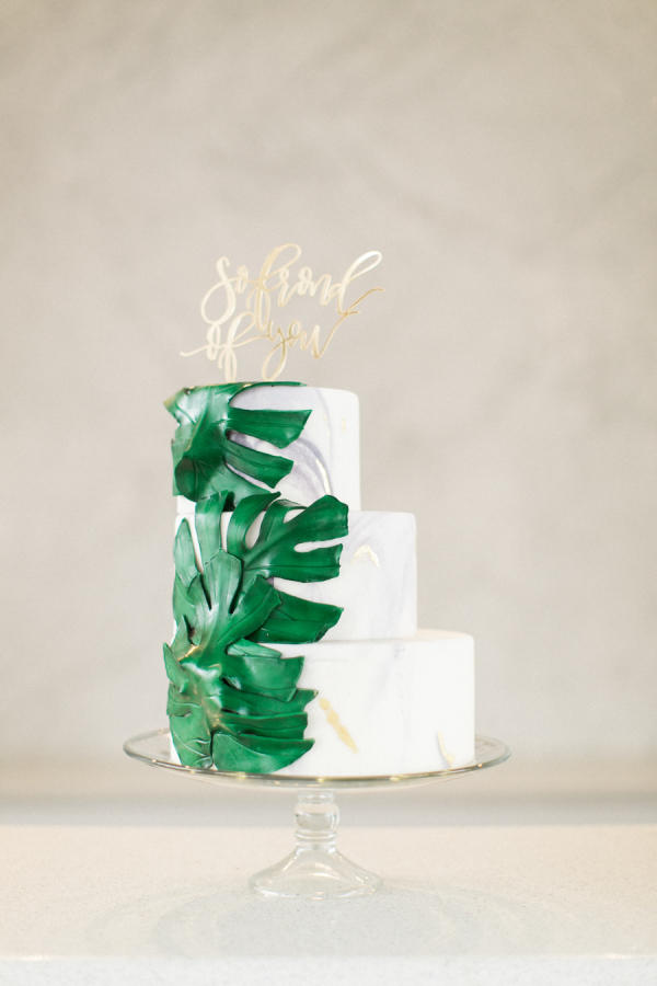 tropical wedding leaves cake styling