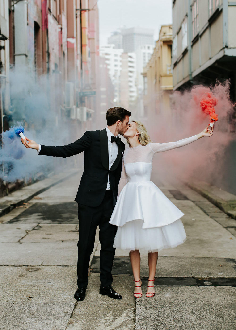 Urban chic wedding street scene with flares