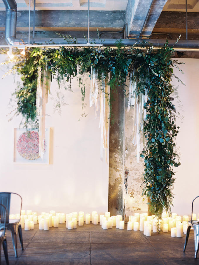 industrial wedding perspex and greenery backdrop