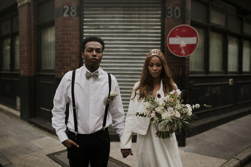 urban wedding bride and groom on the street