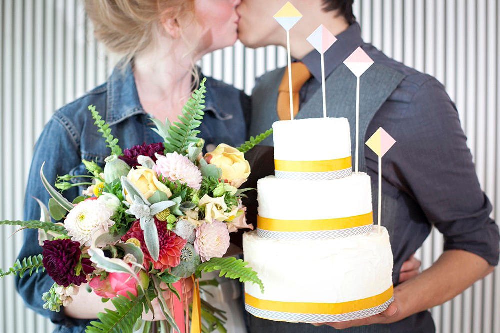 urban wedding casual bride and groom with cake